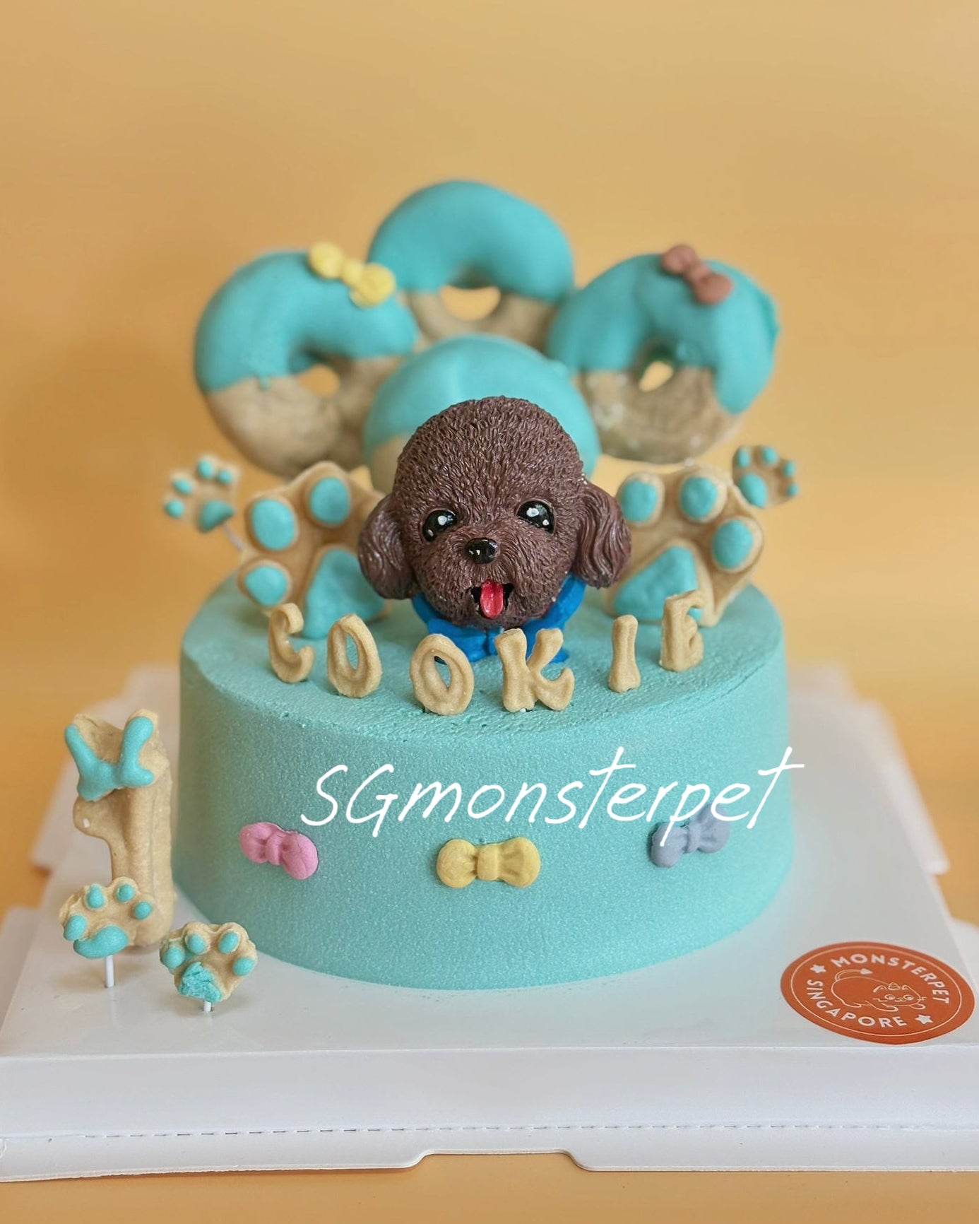 Pet cake with a dog figurine and name