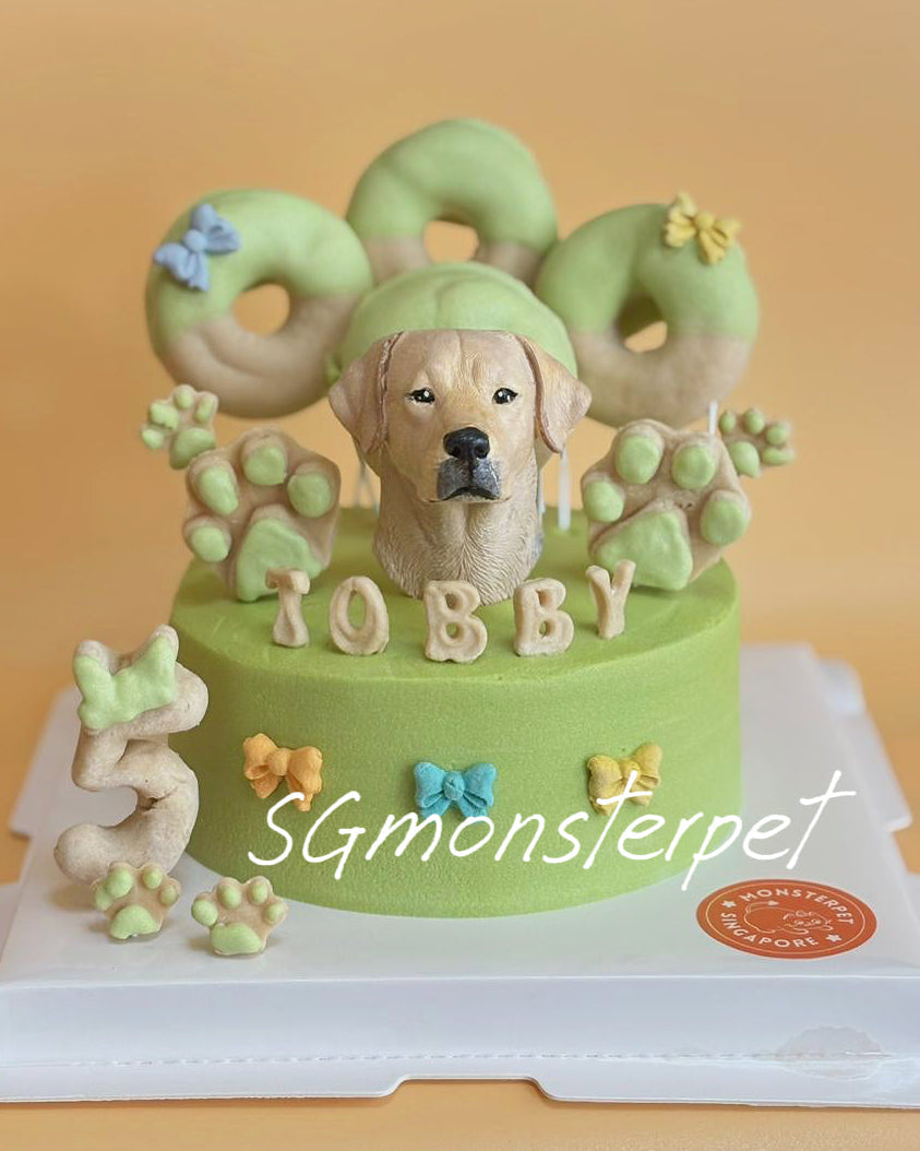 Pet cake with a dog figurine and decorative elements