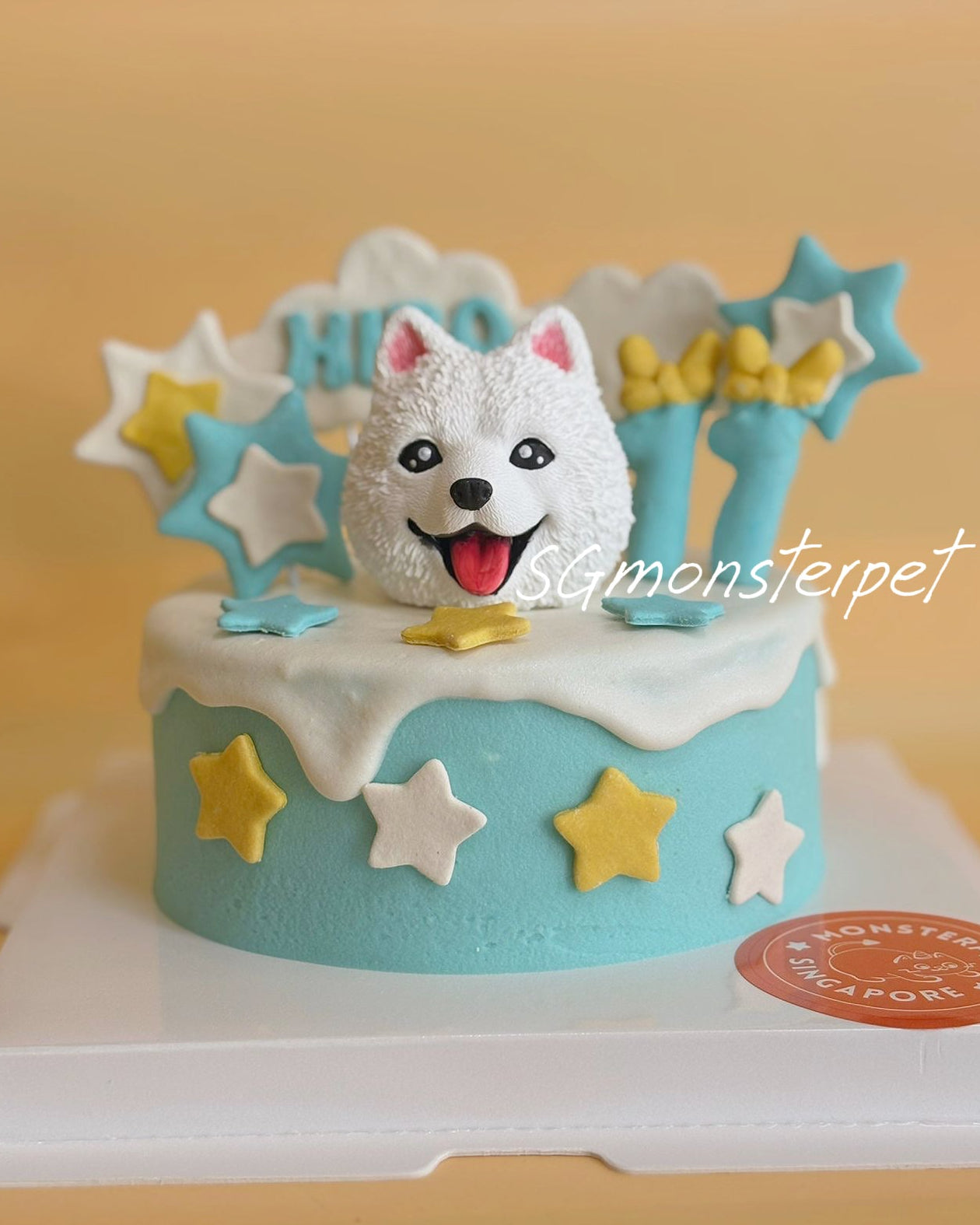 Pet cake with a dog figurine and star decorations