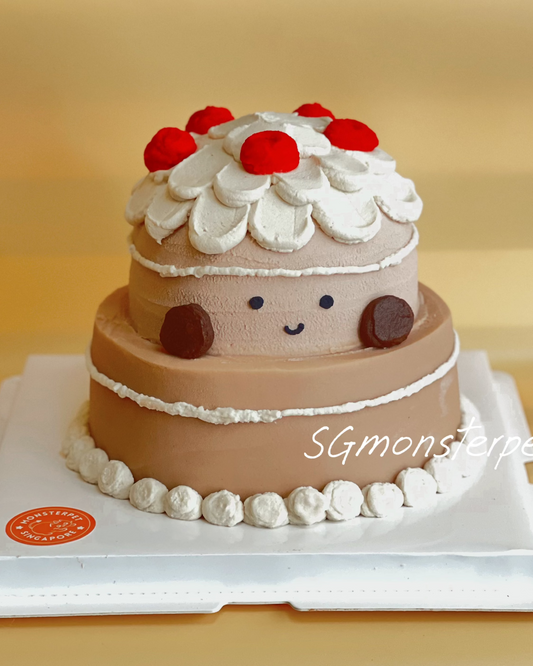 Two-tiered cake with jellycat design