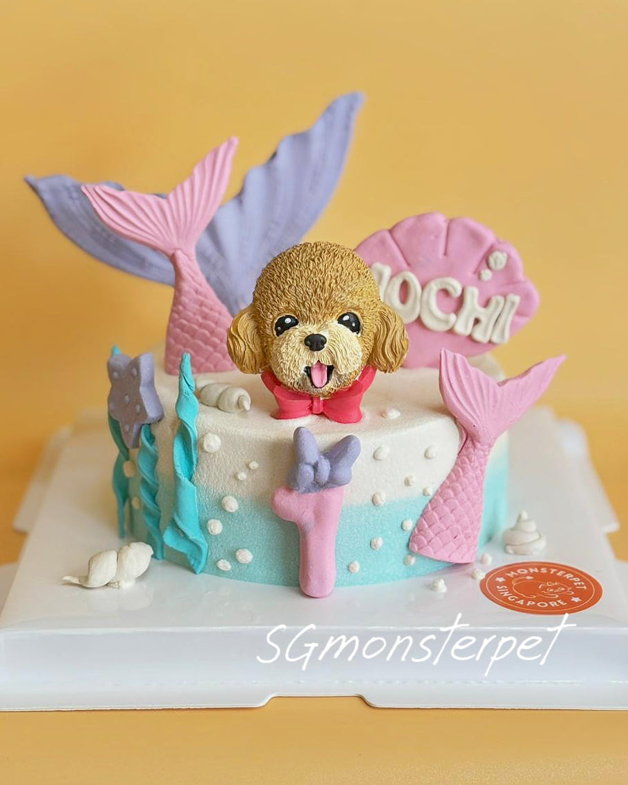 Pet Cake with a teddy bear figurine and mermaid tail decorations 