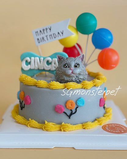Cat-themed birthday pet cake with colorful balloons and 'Happy Birthday'