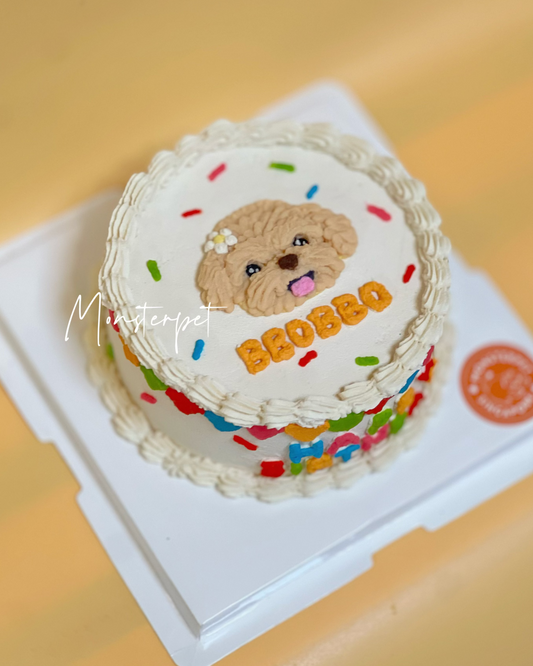 Small round pet cake with a dog illustration and colorful text.