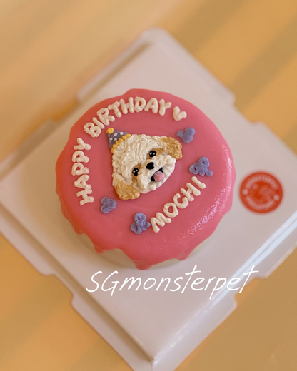 Pink birthday pet cake with a dog design and 'Happy Birthday' text on a yellow background.
