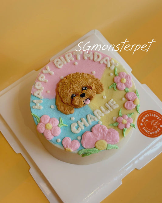 Dog-themed birthday pet cake with 'Happy Birthday Charlie' on a yellow background