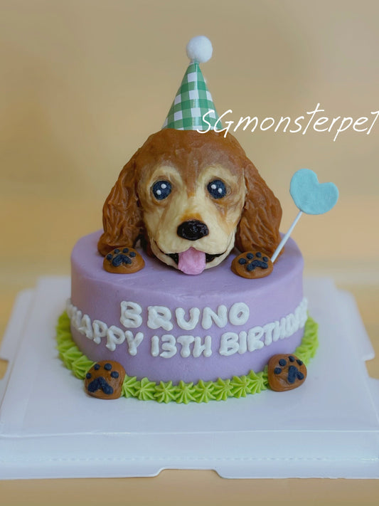 Dog-shaped birthday cake with a checkered hat and 'Happy Birthday' text on a plain background