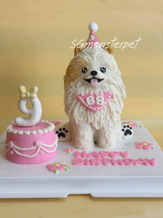 Dog-shaped birthday cake with pink decorations and a small cake on a yellow background