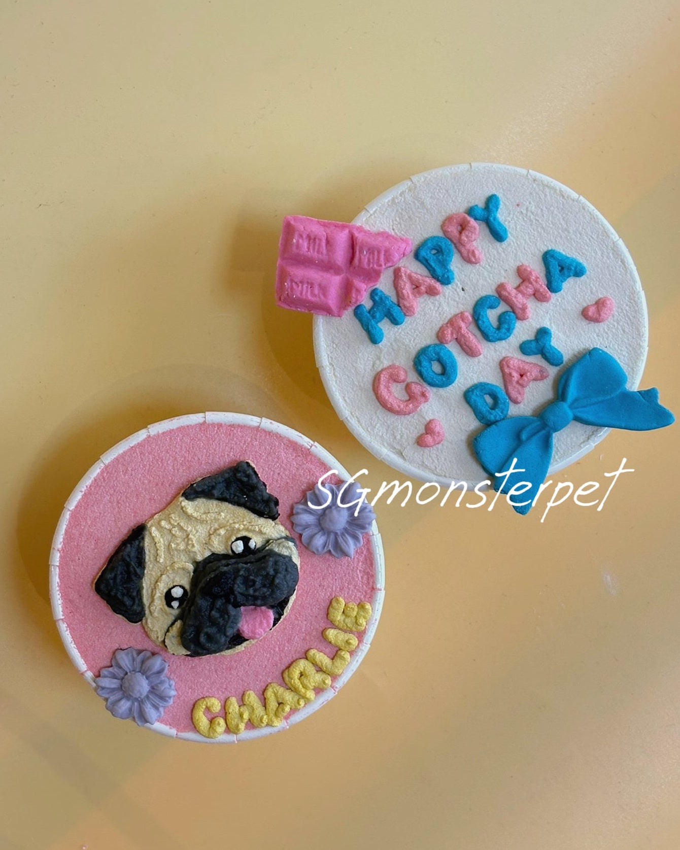 Decorative pet tag with pug face, 'Happy Gotcha Day', and colorful text on a yellow background.