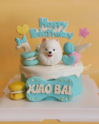 Birthday pet cake with a dog figurine, colorful decorations